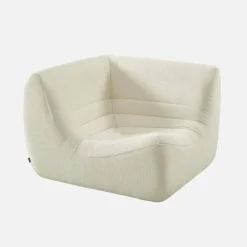 Poltrona angolare in bouclé testurizzato